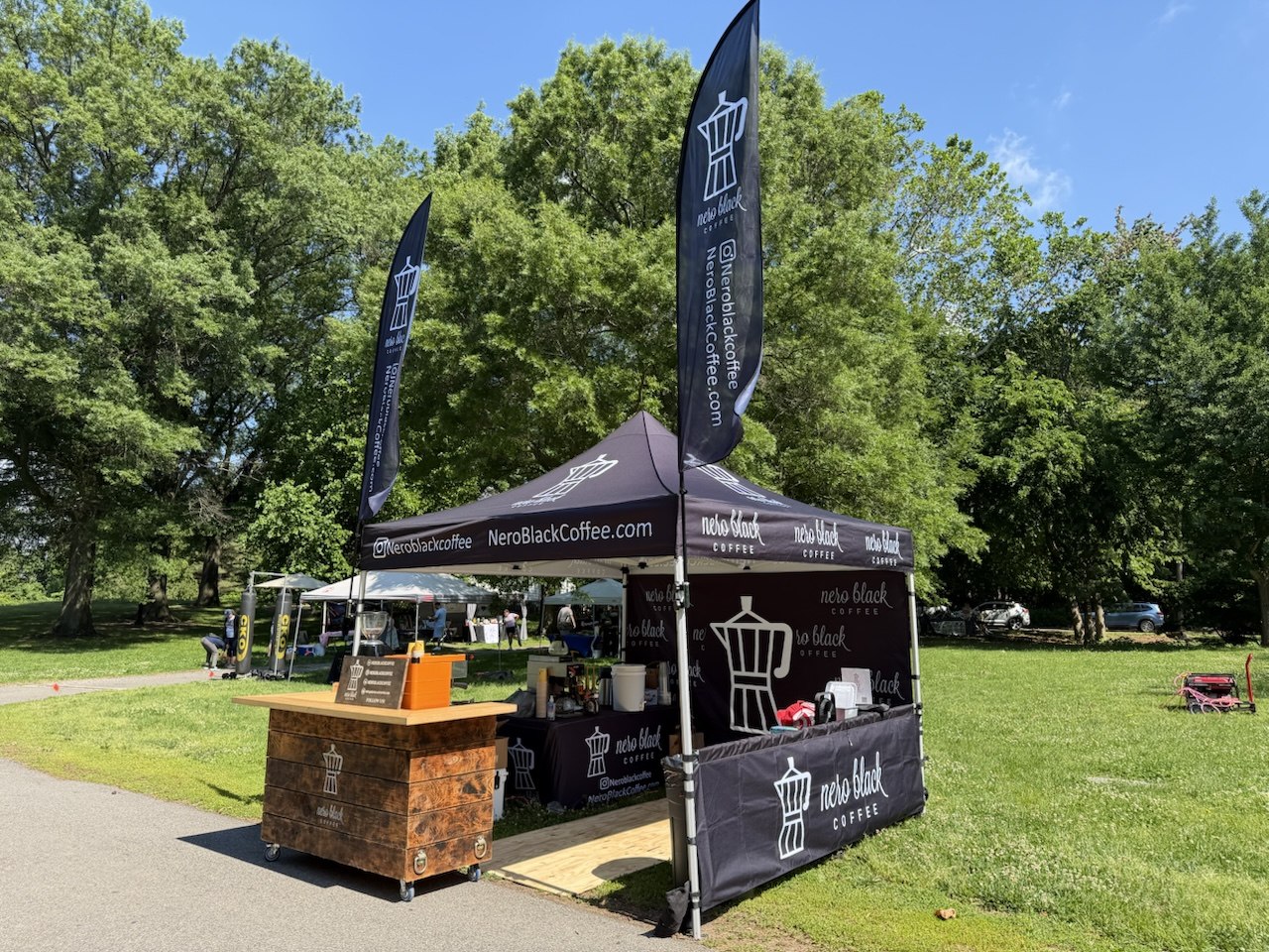 Nero Black Coffee stand setup at an event